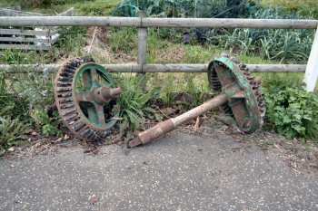 Wooden toothed gearwheels beside the road 9th Sept 2003