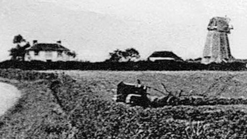 Cutout from above photo showing tracklaying tractor and mill - c.1920