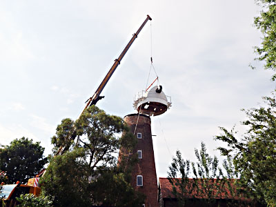 Cap and windshaft ready to be placed on mill tower curb