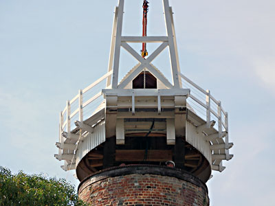 Cap and windshaft ready to be placed on mill tower curb