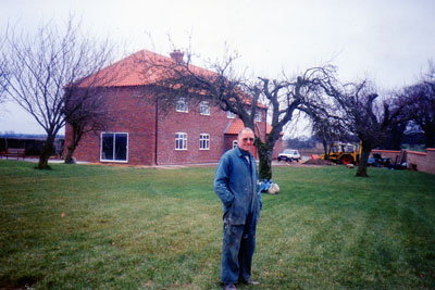 Ron Ashton in front of the new house c.1995