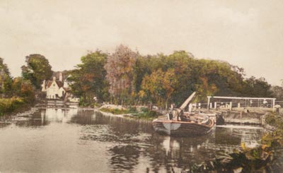A wherry and the lock with the mill in the distance c.1910
