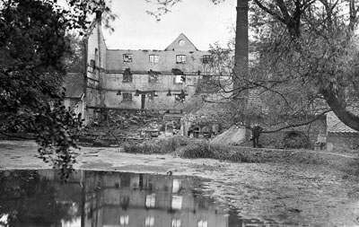 The mill dam and building shell in October 1914