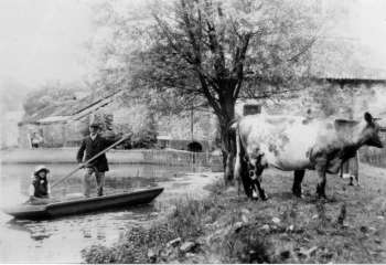 Jack Wheatley and daughter on the millpool c.1910